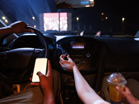 Explore the benefits of a drive-in movie fundraiser for your PTA.